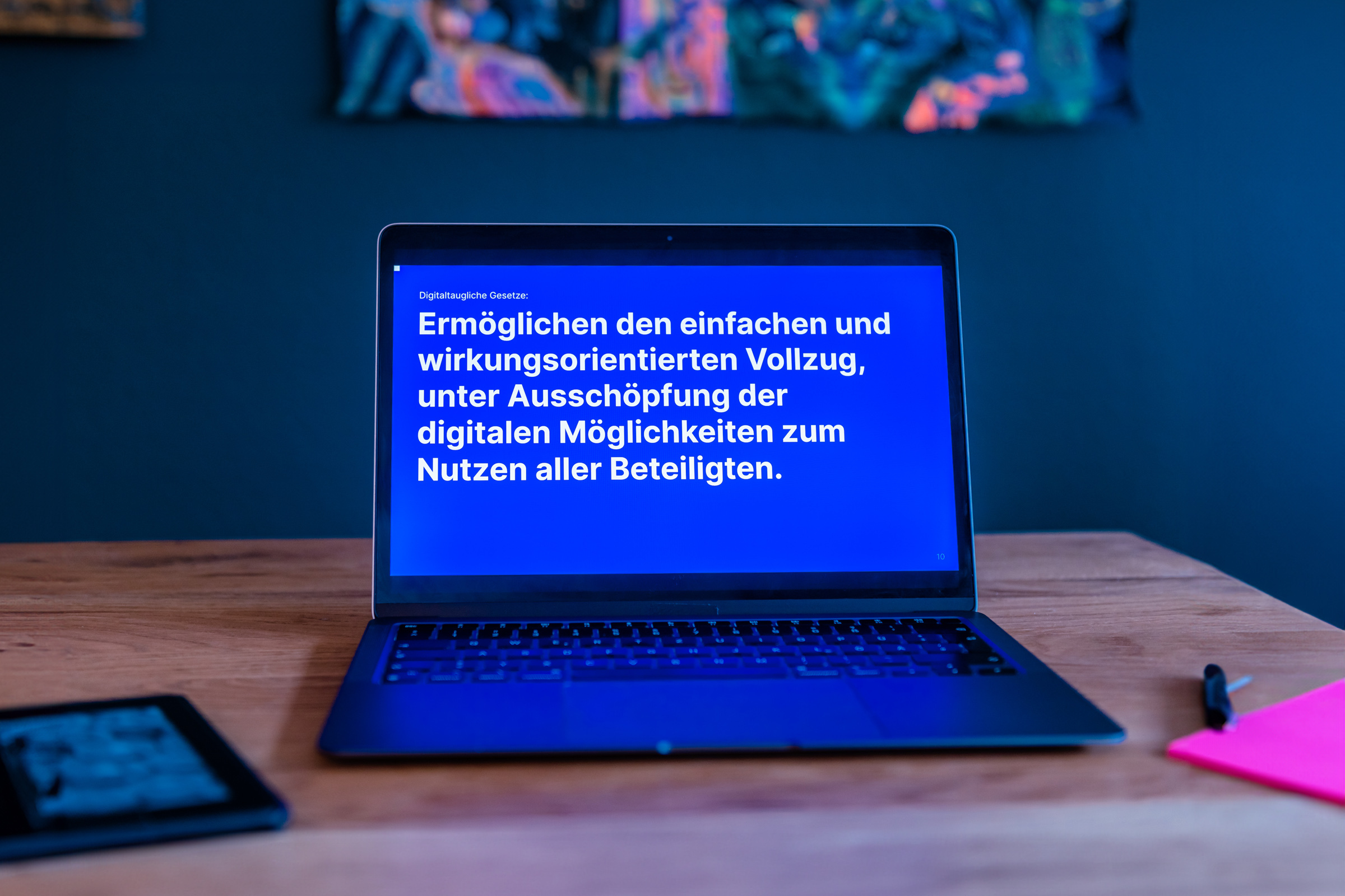 The following statement can be read on a laptop: “Digital-ready laws: Making simple, results-oriented implementation possible by harnessing the full range of digital possibilities to benefit all stakeholders.”